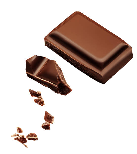 istock Chocolate explosion isolated on white.  Flying milk Chocolate pieces  Top view.  Flat lay. 2155173050