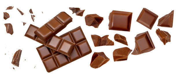 istock Chocolate explosion isolated on white.  Flying milk Chocolate pieces  Top view.  Flat lay. 2155173457