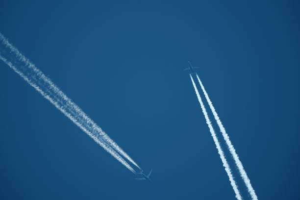 Free Stock Photo of Two Airplanes Flying in the Sky With Smoke Trails ...