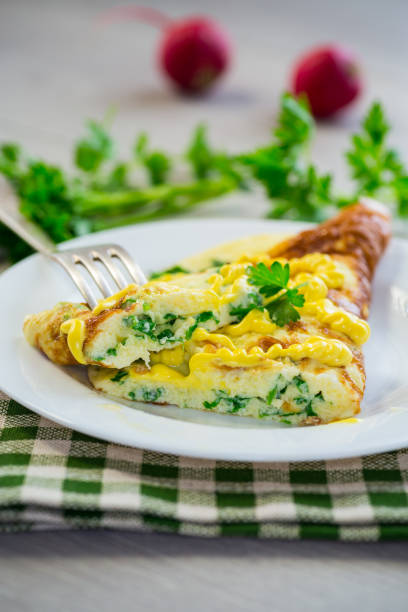 istock fried omelette stuffed with herbs, parsley, dill 2155180529
