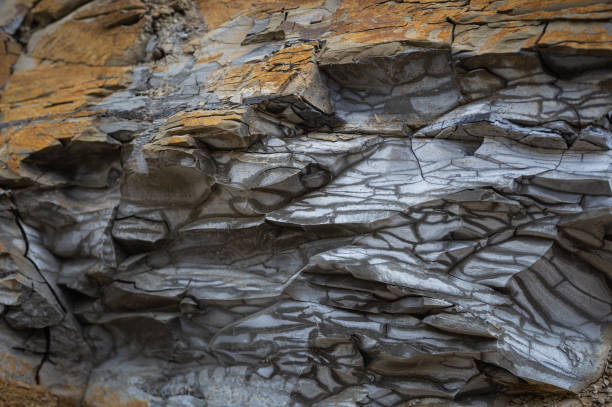 istock layers of rocks are separated by magnificent cracks and balls 2155182139