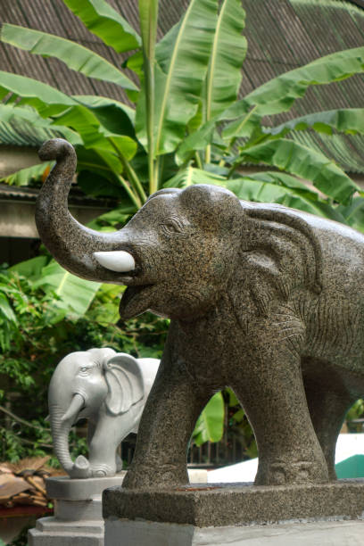 istock Stone elephant sculpture detail from Buddhist temple in Bangkok 2155183106
