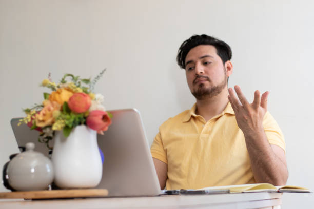 istock Young student with stress trying to resolve a problem in his laptop 2155183226