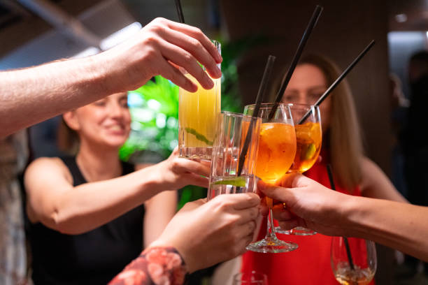 istock Young friends are toasting in a restaurant 2155185126