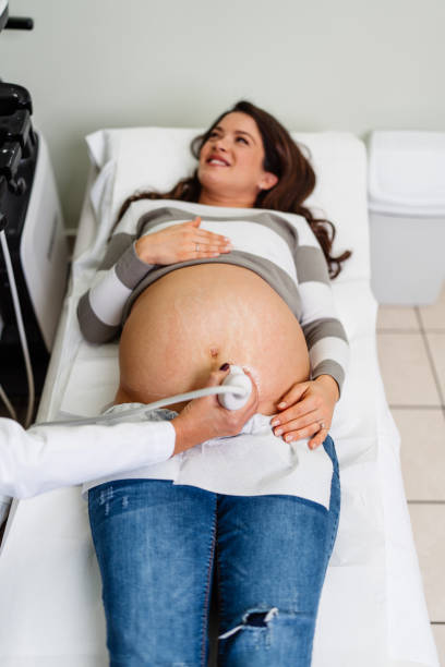 istock Woman at pregnancy checkup. 2155186403