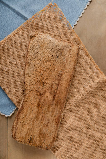 istock rustic driftwood plank over jute and fabric table cloths for mock up 2155187286