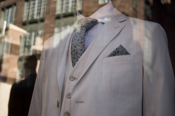istock grey wedding suit on mannequin in wedding store showroom 2155187324