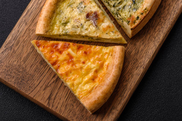 istock Delicious quiche with broccoli, chicken or salmon and cheese 2155190538