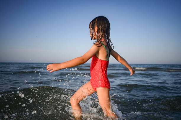 splashing in summer sea.