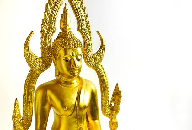 Golden Thai Amulet buddha statue isolated on white background. Buddhism concept. Phra Buddha Chinnarat