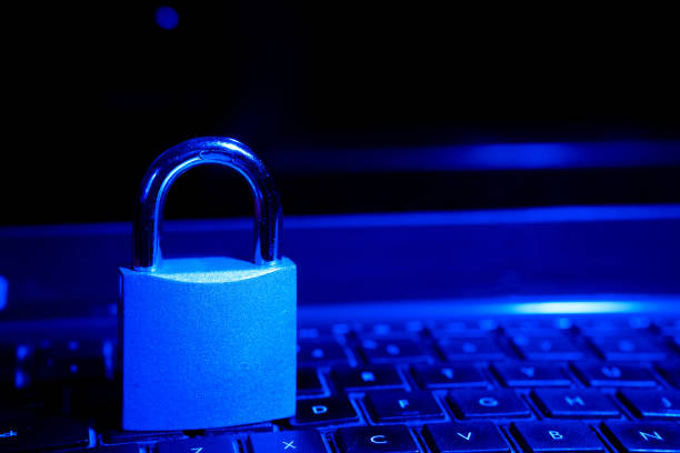 istock Computer security concept with a closed padlock on the keyboard.padlock on top of a laptop keyboard. 2155218398