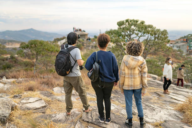 istock Tourists looking at the landscape from above 2155220165
