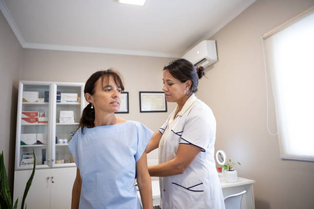 istock Dermatologist preparing her patient for a dermatological procedure 2155224674
