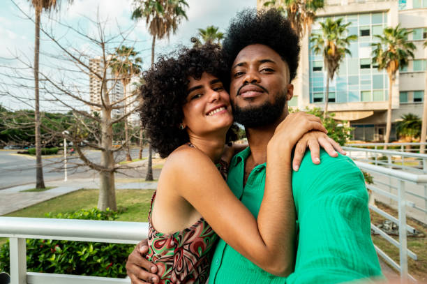 istock Couple taking a selfie outdoors - Camera point of view 2155228076