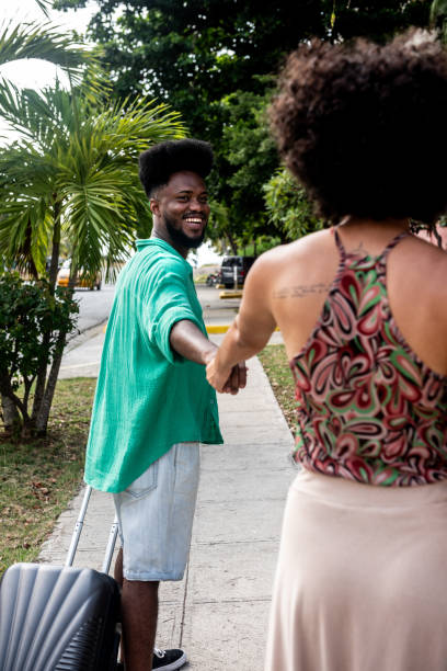 istock Tourist couple walking outdoors 2155228273
