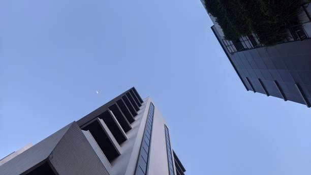 istock Modern office building with ECO concept below the clear sky 2155230921
