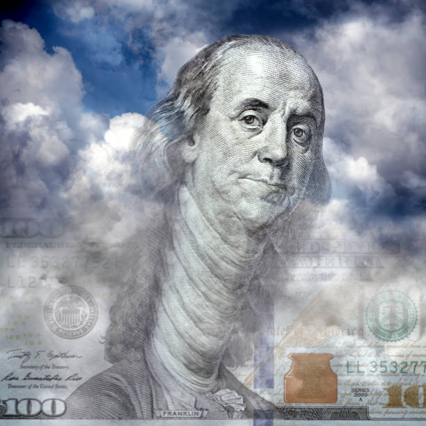istock Conceptual American one hundred dollar bill in cloudy sky 2155233190
