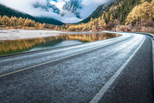 istock Mountain road, fog 2155235856