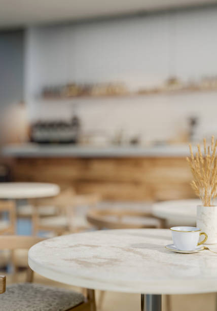 istock A luxury white marble round table features a coffee cup and a vase in a contemporary coffee shop. 2155237043