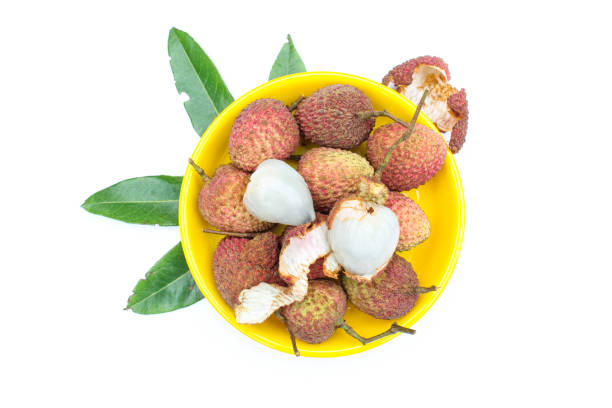 Bunch of Lychees in a bowl. Fresh and healthy fruits. Food background