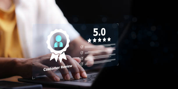 istock Businessman using laptop give rating to service experience on online application. 5-star satisfaction. satisfaction feedback review. 2155240818
