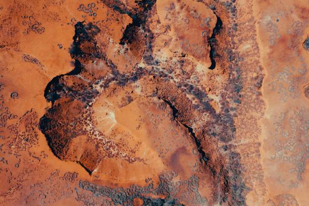 istock Abstract Aerial View of Desert Terrain With Red Rocks and Dirt Textures Patterns Kimberley Broome Pilbara Region Western Australia 2155242255