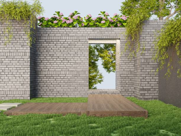 istock Empty brick walled garden behind the house in dark gray tones with an exit gate and wooden walkway on green grass.3d render 2155243573