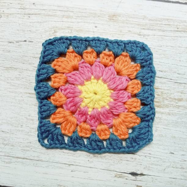 istock Crochet granny square handmade background for background illustrations texture 2155244185