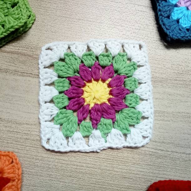 istock Crochet granny square handmade background for background illustrations texture 2155244320