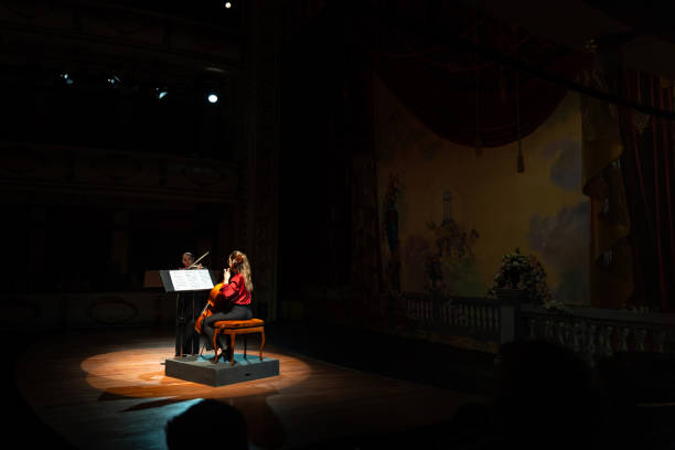 istock Classical music concept. Majestic theater with performers taking center stage 2155247435
