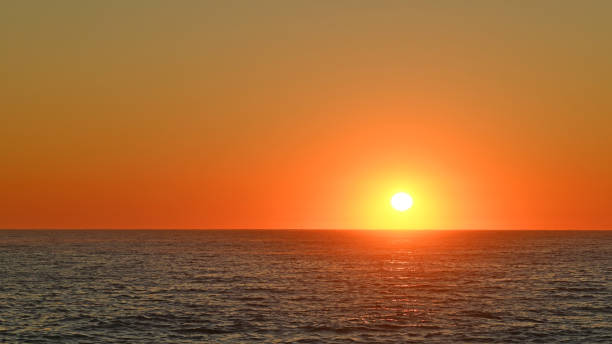 istock Sunrise over the water 2155247820