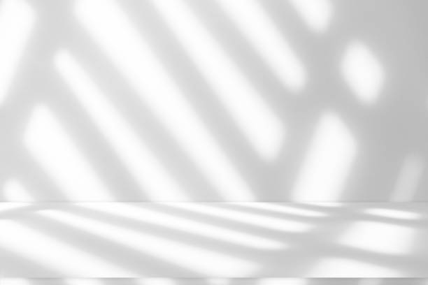 istock Wall interior background, studio and backdrops show products.with shadow from window color white . background for text insertion and presentation product 2155248119