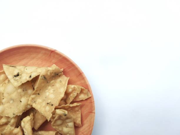 istock Asian traditional food Crispy onion crackers isolated in white background 2155249957