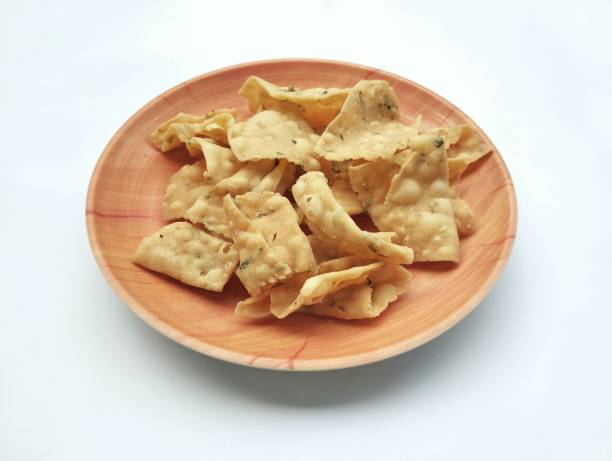 istock Asian traditional food Crispy onion crackers isolated in white background 2155249961