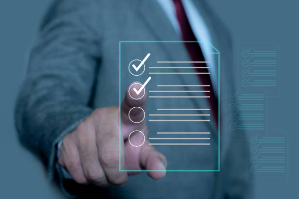 Businessman check and check mark on document online. Businessman tick off questionnaire, Business Agreements and Approvals, Digital checklist option. Check list concept.