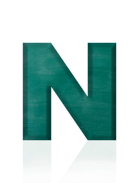 Close-up of three-dimensional blackboard alphabet letter N on white background.