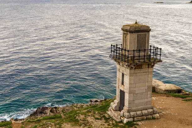 istock Historic old lighthouse on the shore of Rovinj 2155253636
