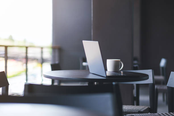 istock A laptop computer and a cup of coffee on the table 2155254654