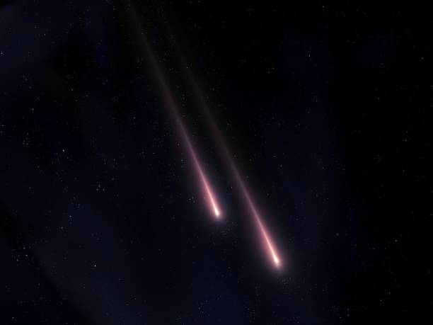 istock Two meteors isolated. Shooting stars, night view. 2155255057