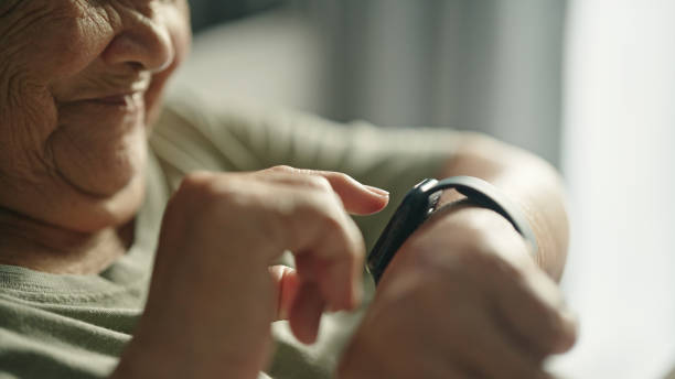 istock Monitor sleep tracking with smart watch in the morning. 2155258657