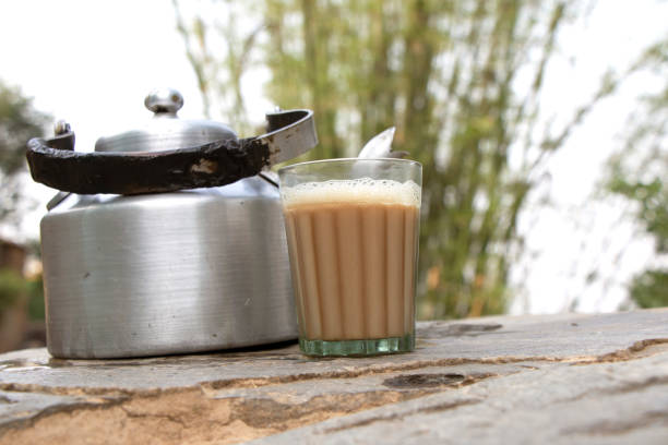 istock Tea served in a glass with a kettle 2155259133