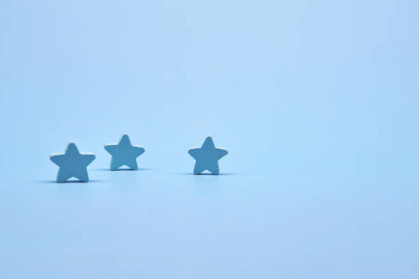 istock Blue wooden stars shapes 2155263459
