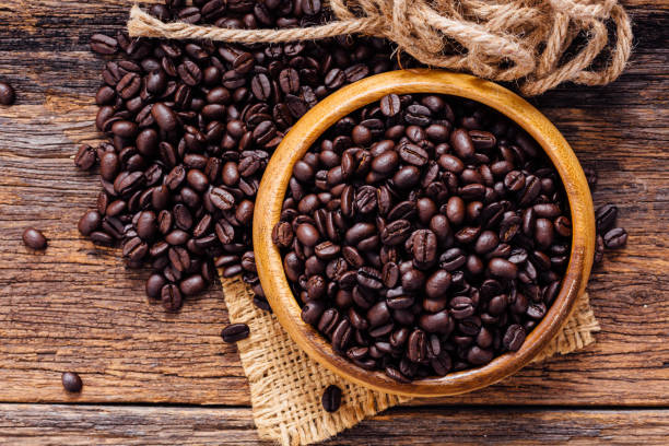 istock coffee beans on wooden background 2155266454