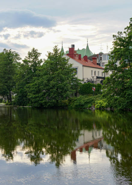 istock View of a building by the lake during evening 2155267173