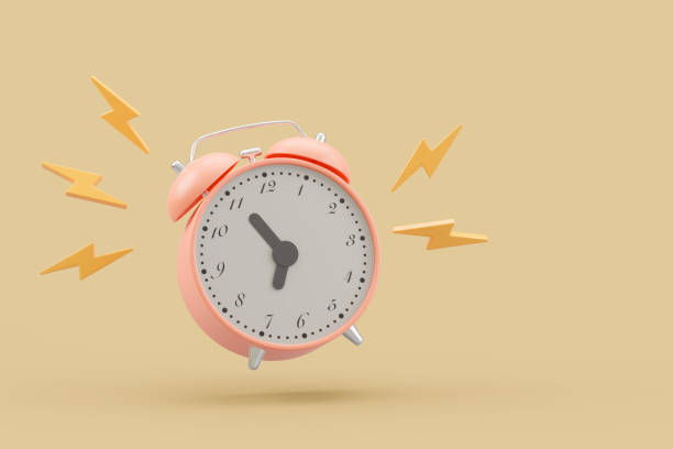 istock A pink alarm clock with yellow lightning bolts around it. on light blue background. 2155269792