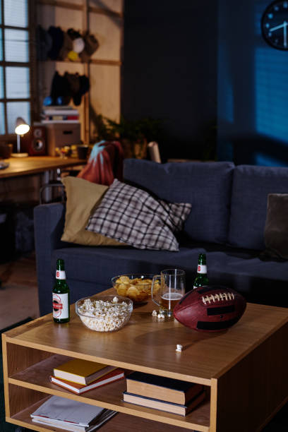 istock Beer Bottles And Snacks On Table In Living Room 2155273173