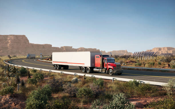 istock Digitally Generated Image of a Transport Truck on a Curvy Desert Road 2155273227
