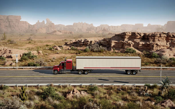 istock Digitally Created Transport Truck Driving on Route 66 in Desert 2155273241