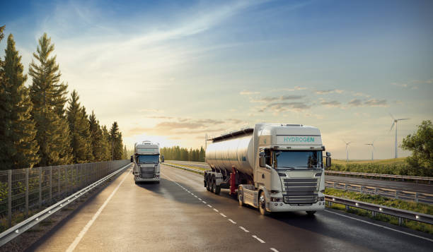 istock Digitally Created Hydrogen Transport Trucks on Rural Highway 2155273278