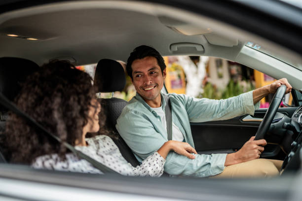 istock Couple talking inside a car on the city 2155274946
